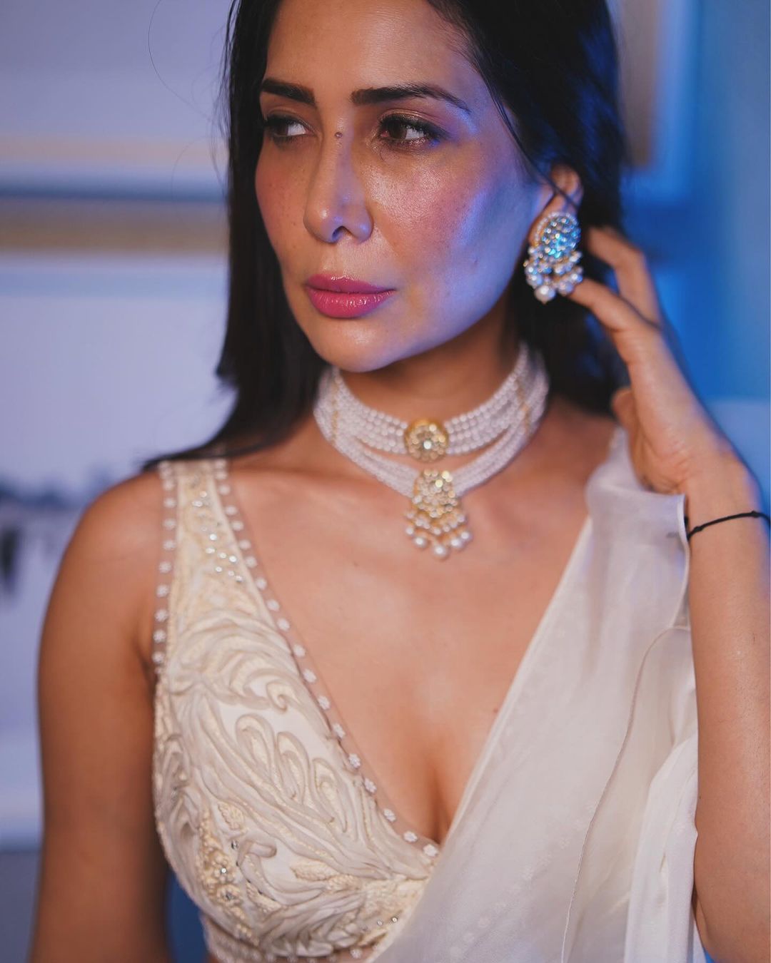 Bollywood Actress Kim Sharma Stills in White Saree